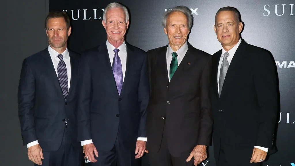 Where to watch Sully cast photo featuring the main actors from the movie in a promotional group shot
