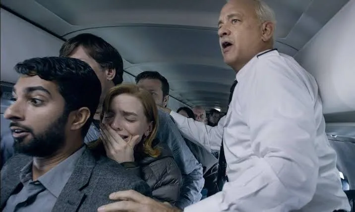 Where to watch Sully scene still showing a tense cockpit or emergency landing moment from the movie