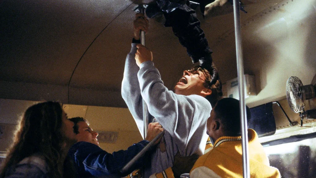 Where to watch Jeepers Creepers scene still showing a tense nighttime moment from the horror film