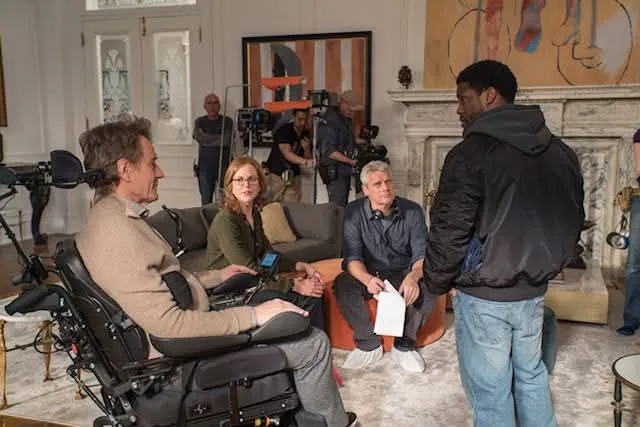 Where to watch The Upside cast photo featuring the main actors from the movie in a promotional group shot