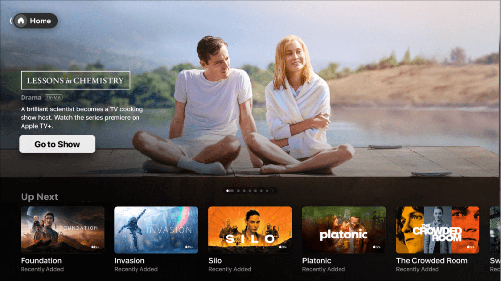 Apple TV homepage screenshot showing featured originals, trending movies, and recommendations for what to watch and streaming movies online