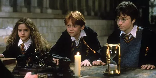 Where to Watch Harry Potter scene still showing a memorable Hogwarts moment with key characters on screen