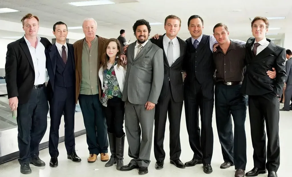 Where to Watch Inception cast photo featuring the main actors from the movie in a promotional group shot